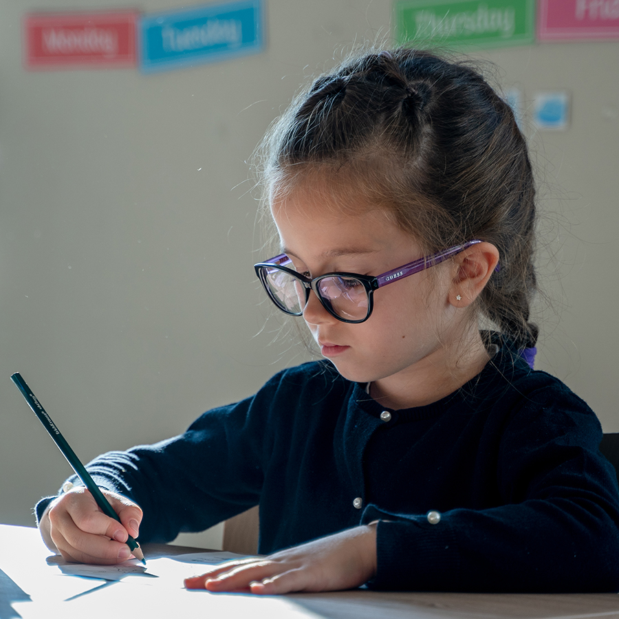 Child making a creative project